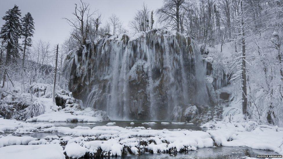 Winter in Plitvice lakes national park, a UNESCO World Heritage Site, Croatia. Waters flowing over limestone and chalk over thousands of years have created natural dams which in turn have produced a series of beautiful lakes, caves and waterfalls.