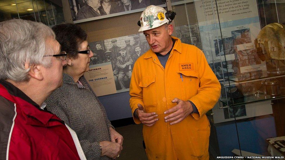 A miner guide with visitors, pictured in 2012