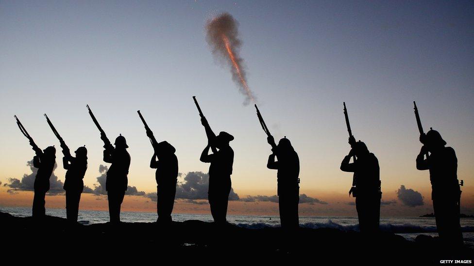 Members of the Albert Battery shoot a volley of fire during the ANZAC dawn service at Currumbin Surf Life Saving Club on 25 April 2013 in Gold Coast, Australia