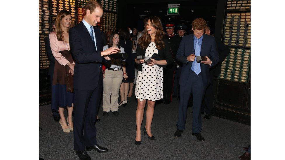 William, Kate and Harry in the wand shop