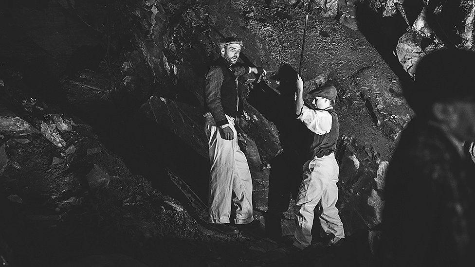 James Evans as quarryman and Rob Young as apprentice