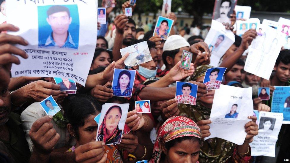Relatives with pictures of missing loved ones. 27 April 2013
