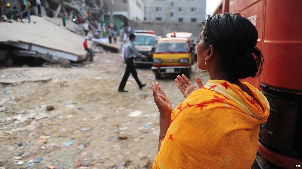 Relative prays near the scene. 27 April 2013