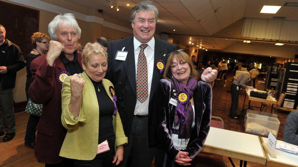 UKIP supporters celebrate with the party's Colin Guyton (second right) who won the Drybrook and Lydbrook seat in on Gloucestershire County Council.