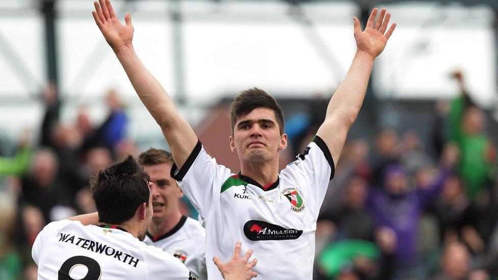 Jimmy Callacher celebrates after his headed goal puts Glentoran 2-1 ahead in the first period of extra-time