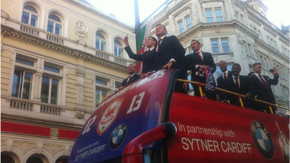 The buses made their way slowly down St Mary Street and the players waved to the fans.