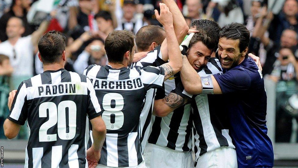 The Juventus players celebrate at the end of the 1-0 win at home to Palermo that secured a record 29th Serie A title with four games to play