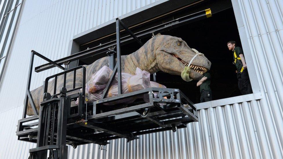 Animatronic figure being loaded into Centre for Life