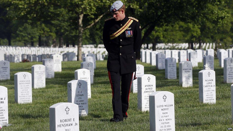 Prince Harry walking through Arlington cemetery