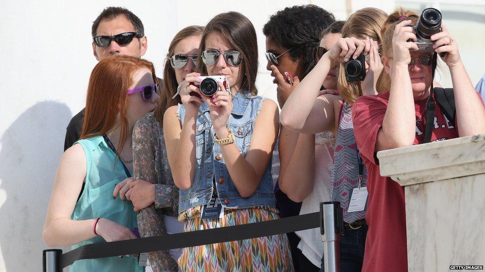 Young Prince Harry fans with cameras