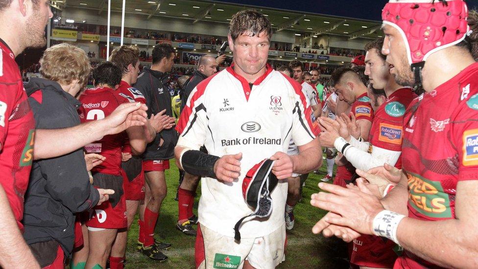 Ulster captain Johann Muller is applauded off the pitch by the Scarlets players after the game