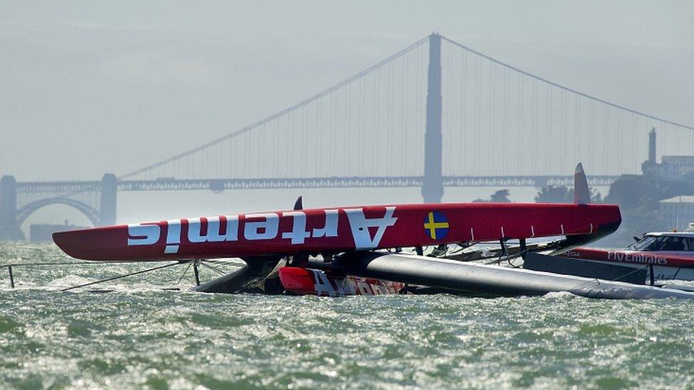 2013: British Olympian Andrew Simpson is killed when he is trapped under the upturned hill of his Artemis yacht when it capsizes and breaks up in a training accident in San Francisco on 9 May.