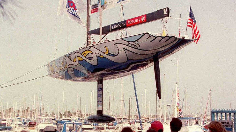 1995: Young America unveil the lead bulb on their keel ahead of the US's America's Cup defence against Sir Peter Blake's Team New Zealand.