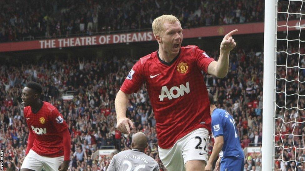 Paul Scholes celebrates scoring against Wigan Athletic