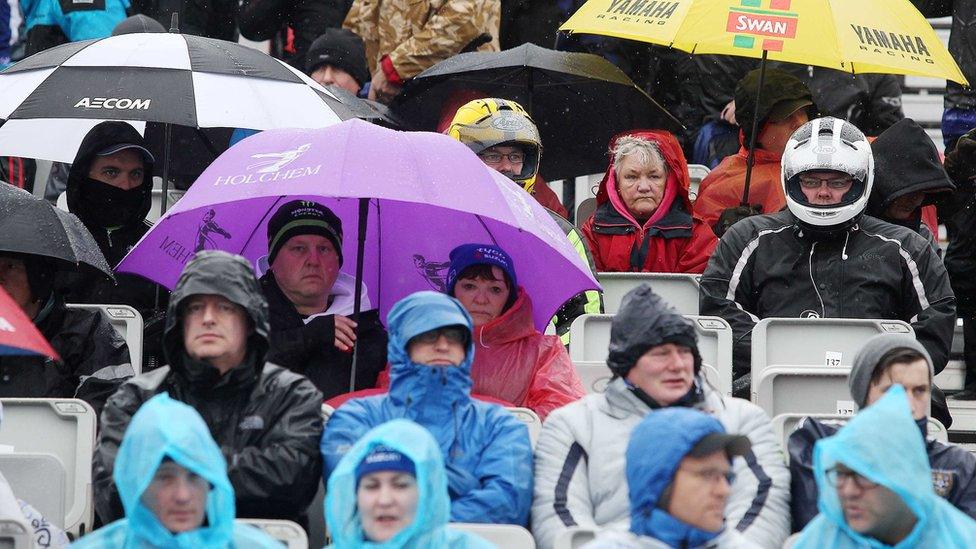 Spectators endured a frustrating wait in the rain for some road racing action