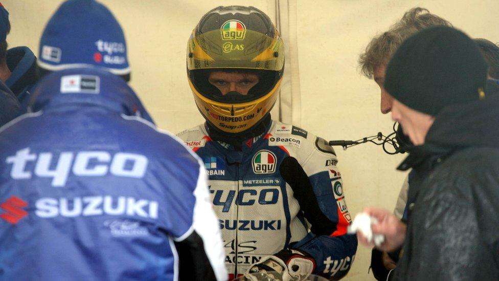 Lincolnshire rider Guy Martin waits as the rain forces a delay to Saturday's schedule