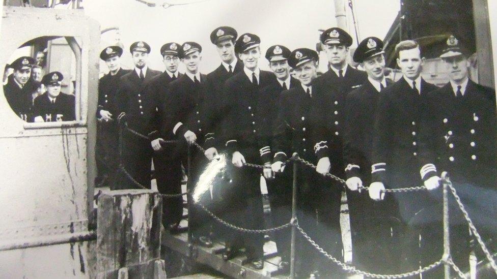 Crew of the SS Rathlin photographed on the gangplank. The Rathlin was the most successful rescue ship during the Arctic convoys