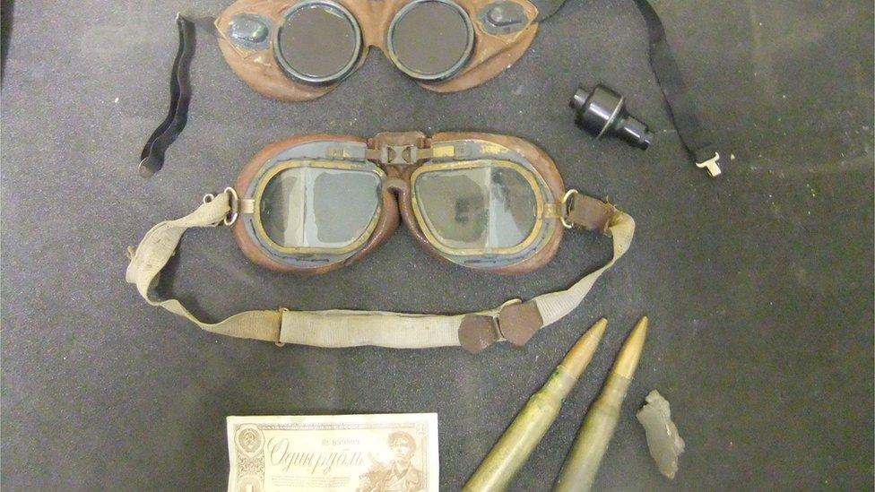 These objects belonged to Sub-Lieutenant D Whittick who served on board HMS Nairana from 1944 to 1946. Whittick was a Royal Naval Volunteer Reserve, 835 squadron of the Fleet Air Arm and flew Fairey Swordfish and Grumman Martlet on convoy escort duty to and from Murmansk in Russia.