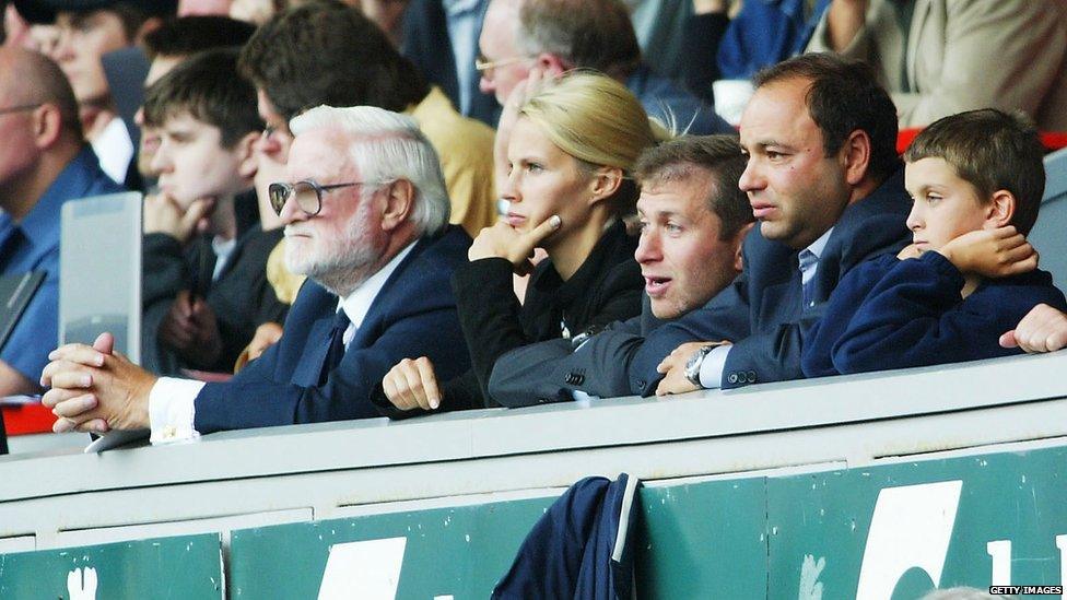 New Chelsea owner Roman Abramovich (third from right) watches his side win after the Premiership match between Liverpool and Chelsea at Anfield on 17 August, 2003 in Liverpool