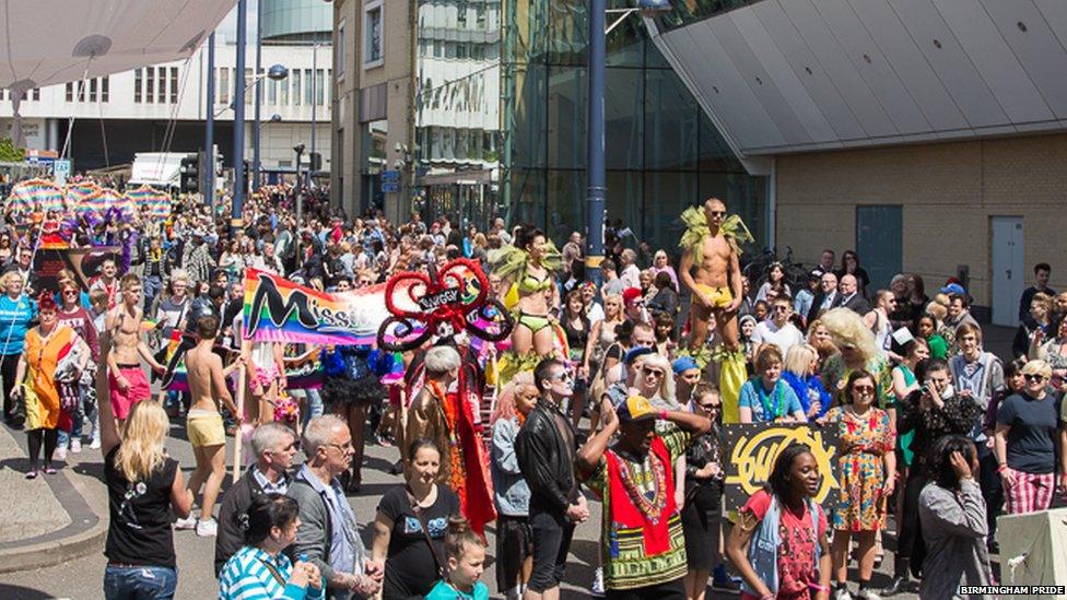 Crowds taking part in the parade