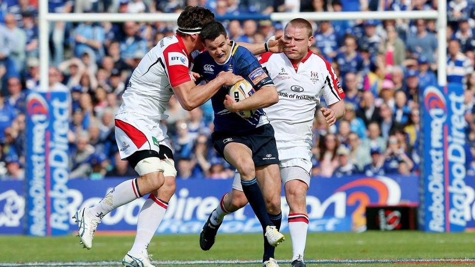 Ulster's Robbie Diack and Tom Court attempt to halt the progress of Leinster fly-half Jonathan Sexton