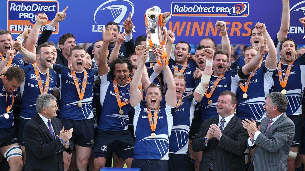 Jamie Heaslip lifts the Pro12 trophy aloft after Leinster's six-point victory at the RDS