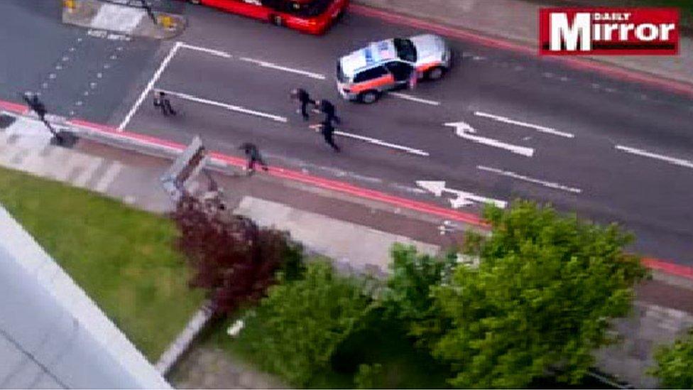 A still from video footage of the confrontation between armed police and the suspects