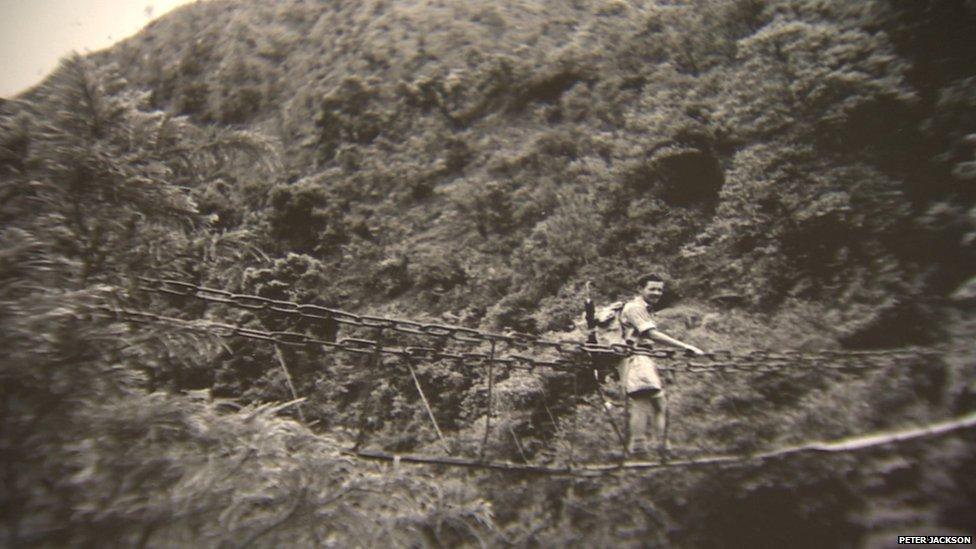 Peter Jackson on a bridge on his expedition to Everest