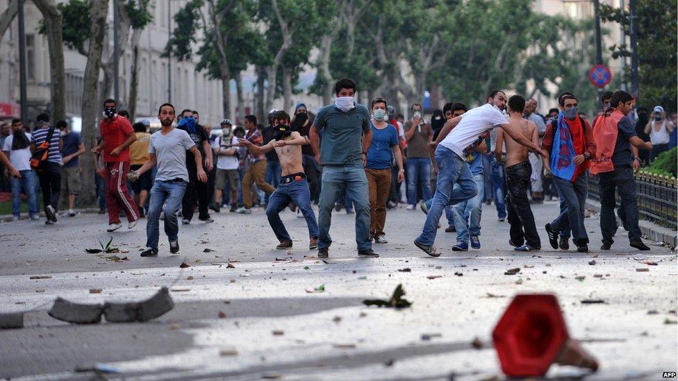 Protesters clash with Turkish riot police in the Taksim Square area of Istanbul, Turkey, 31 May 2013