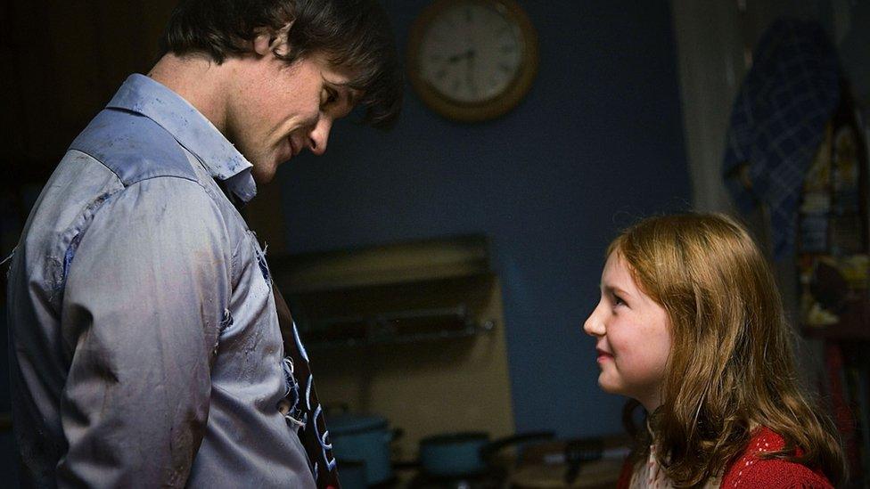 Matt Smith's Doctor with a young Amy Pond