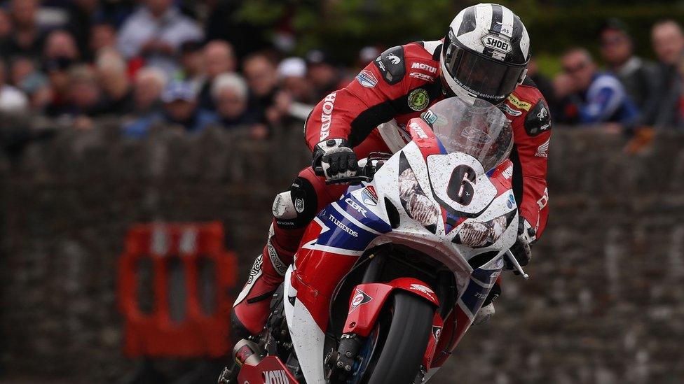 Race winner Michael Dunlop pictured onboard his Superbike powering through St Ninian's crossroads