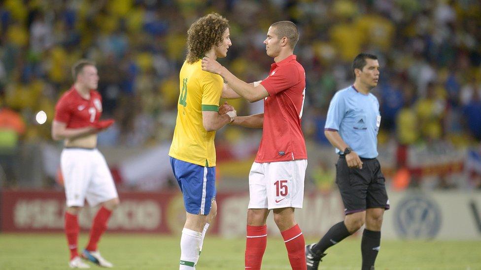 David Luiz and Jack Rodwell embrace