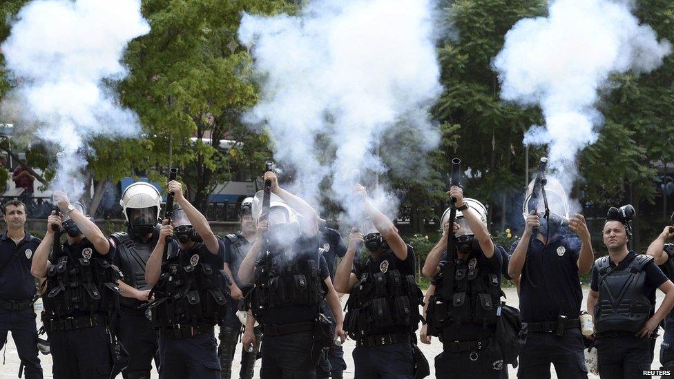 Riot police fire tear gas during a protest in central Ankara, 2 June.