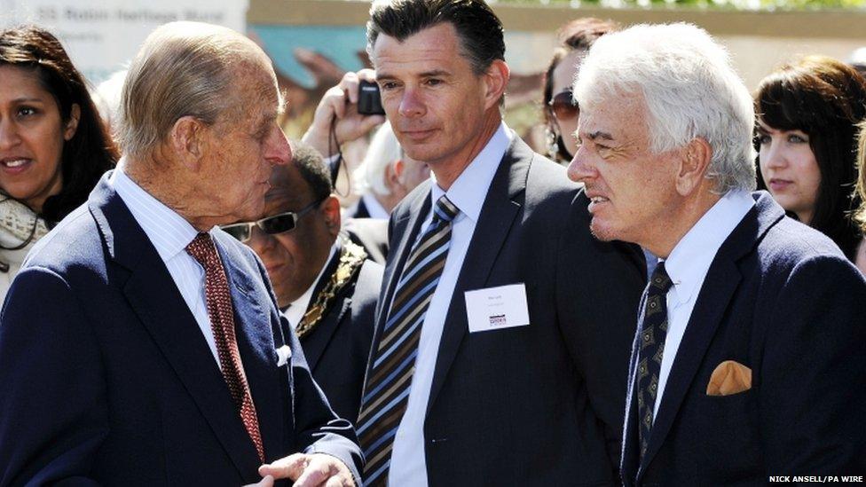 The Duke of Edinburgh talks to designer Nicky Haslam (right), whose grandfather Arthur Ponsonby designed the SS Robin