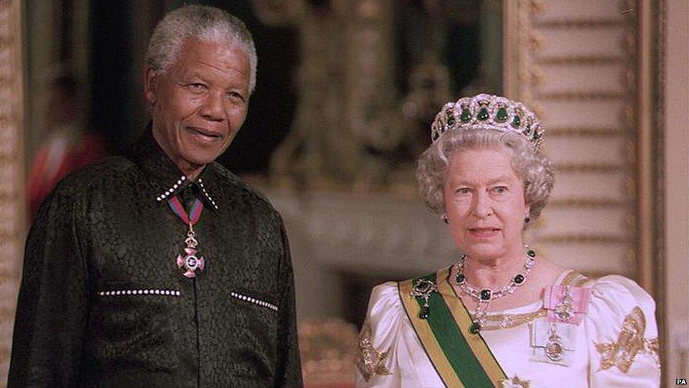 Nelson Mandela with the Queen in 1996