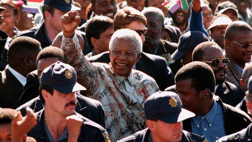 Nelson Mandela at an election rally in 1999