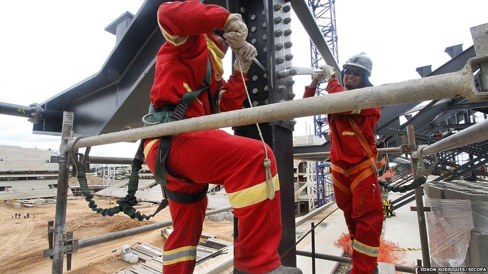 Construction workers at the site of the Arena Pantanal, in Cuiaba, Mato Grosso State, Brazil