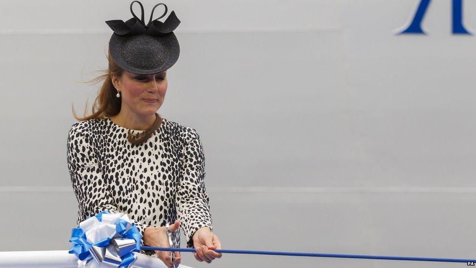 Duchess of Cambridge cutting ribbon to release champagne bottle