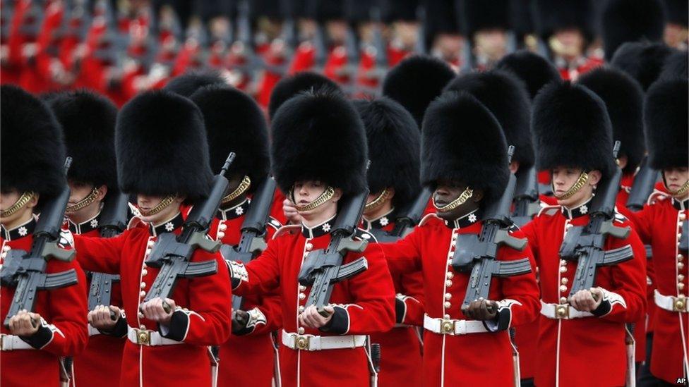 Foot Guards march to the Horse Guards Parade, as part of the Trooping the Colour parade, in London