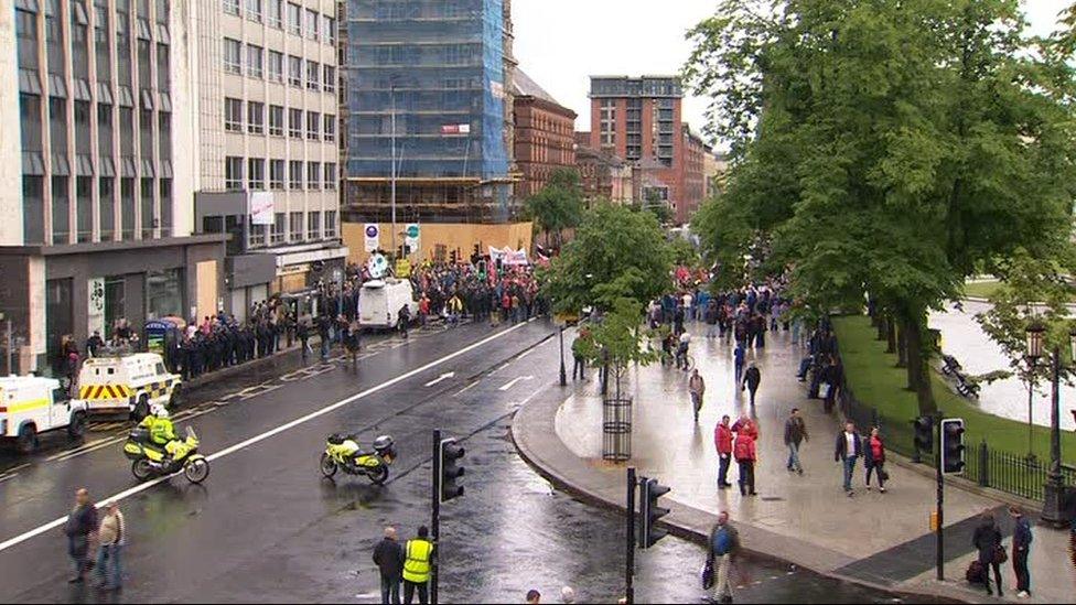 The marchers gathered for a public address at the front of Belfast City Hall