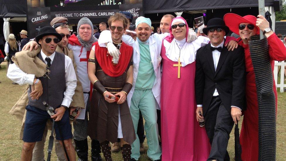 Festival-goers in fancy dress