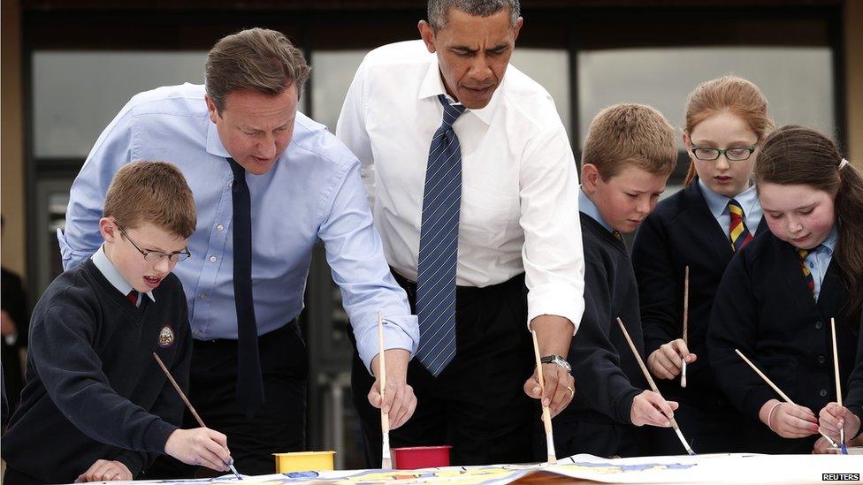 UK Prime Minister David Cameron and President Obama with school children in Enniskillen