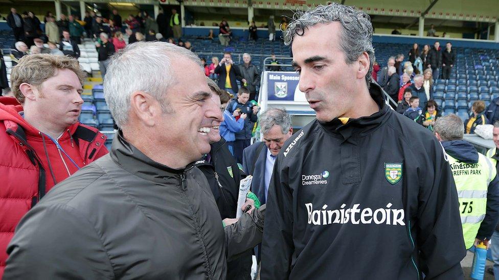 Europe's Ryder Cup captain Paul McGinley congratulates Donegal manager Jim McGuinness after the Ulster Championship semi-final at Breffni Park in Cavan