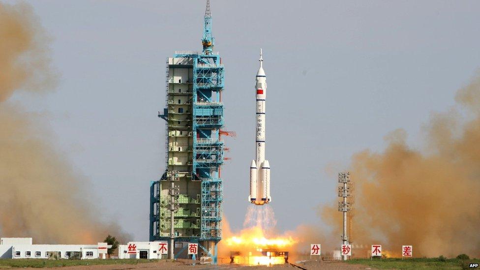 China's Shenzhou-10 rocket blasts off from the Jiuquan space centre in the Gobi Desert on 11 June 2013