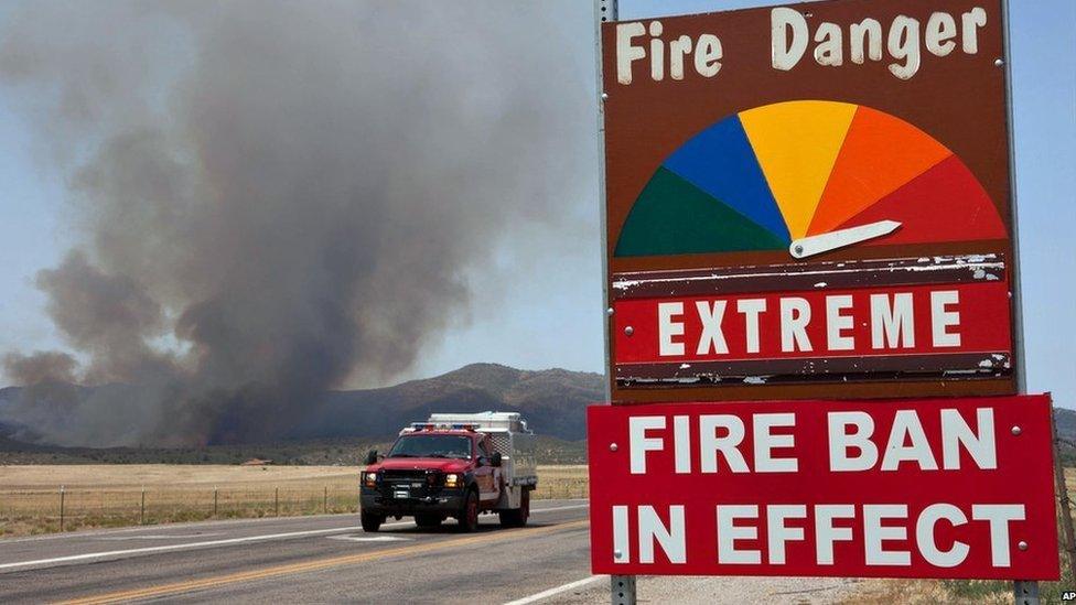 Fire engine moves along Hays Ranch Road in Yarnell (30 June 2013)