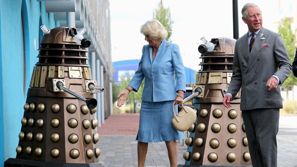 The Prince of Wales and Duchess of Cornwall and two Daleks