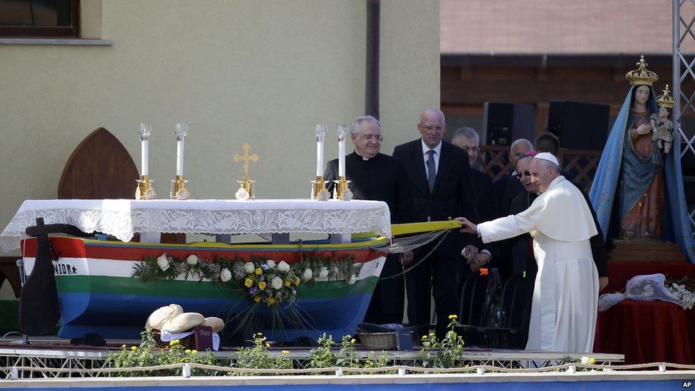 Pope Francis prepares to say Mass in Lampedusa