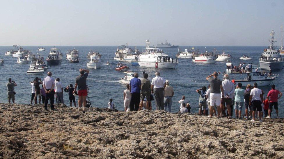 Lampedusans welcome the Pope to their island