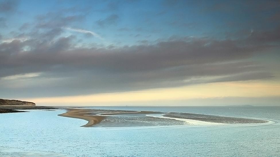 Sand spit revealed as the tide goes out at St Mary’s Well Bay, Vale of Glamorgan by Callum Hamilton