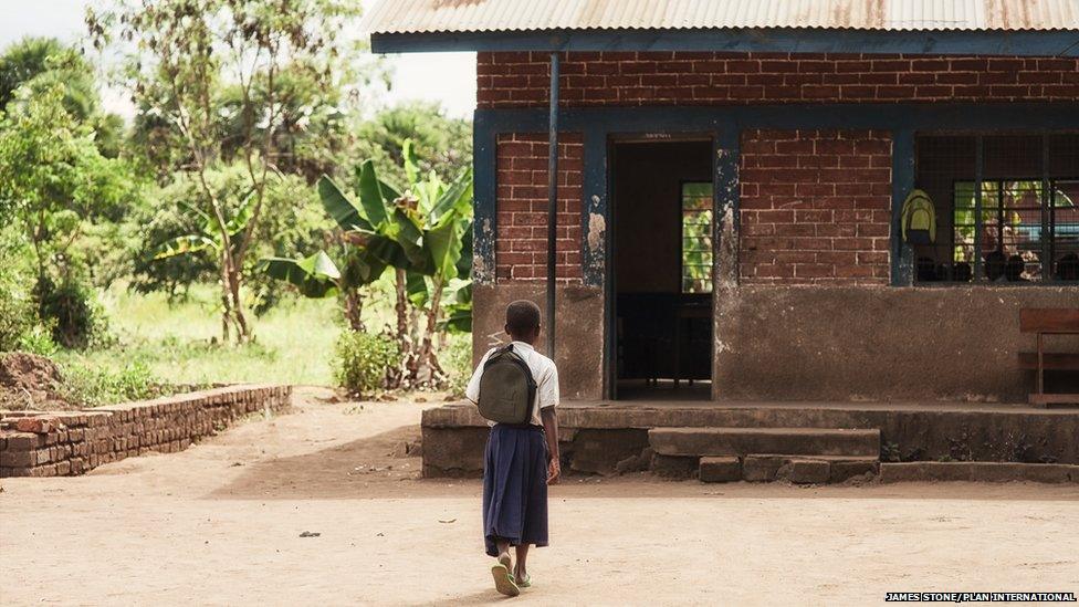 Tanzanian schoolgirl Sylvia arriving at her school